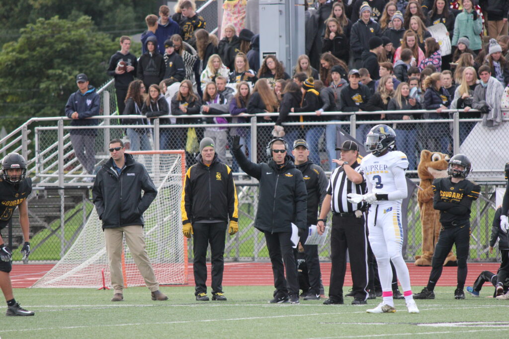 Dr. Michael Stanton providing sideline coverage at a local high school football game